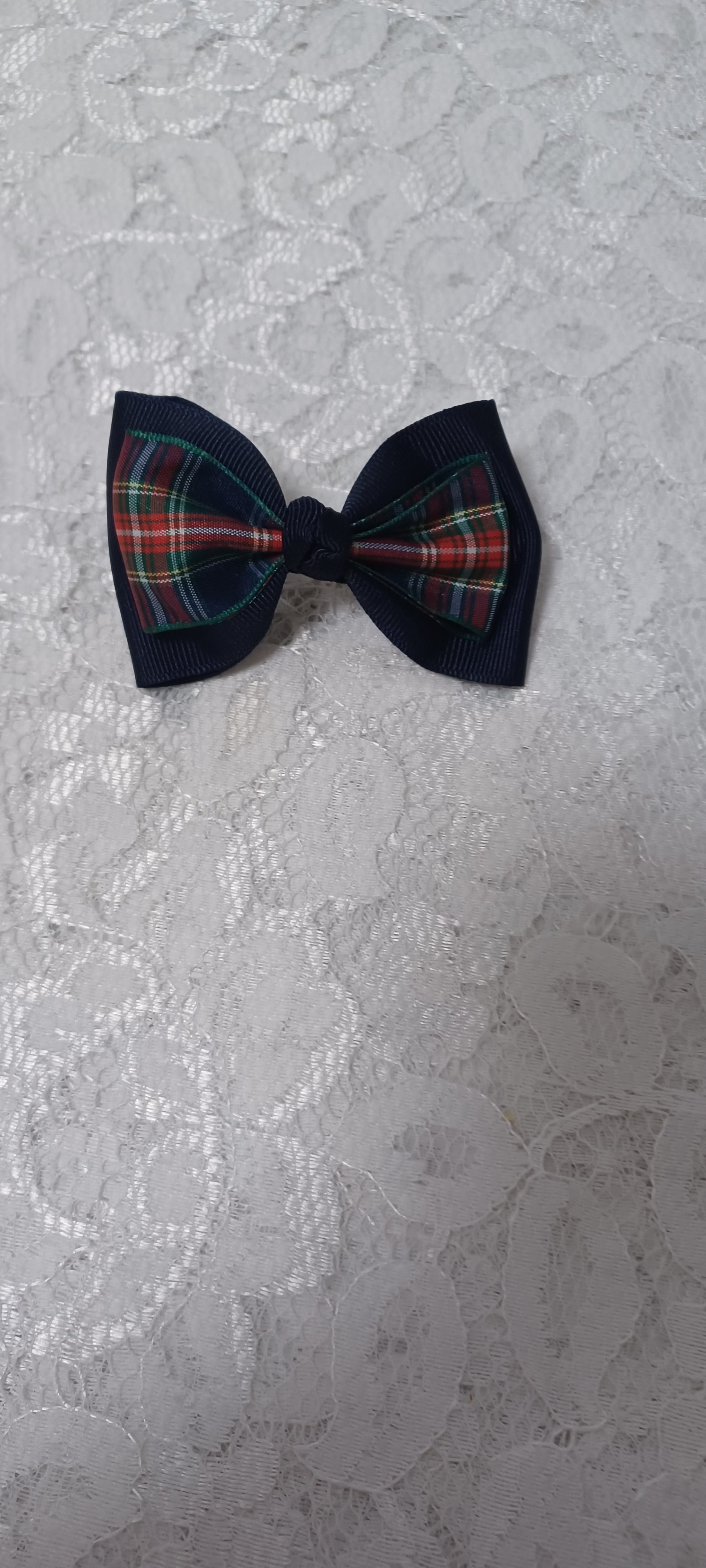 Navy Barrette Bow With Red Green Navy Plaid Overlay On The Bow