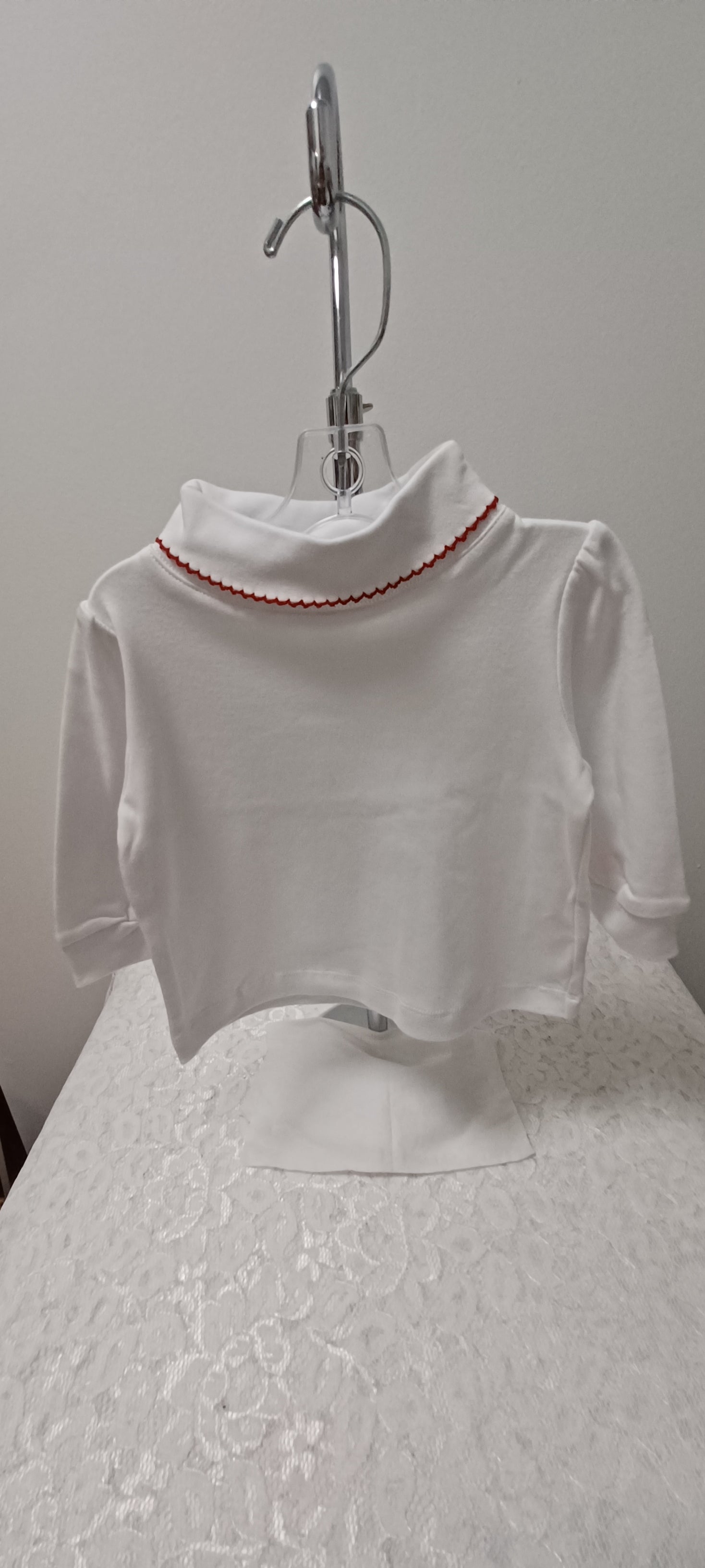 Girls White Long Sleeve Turtleneck Top With Red Trim On The Neck